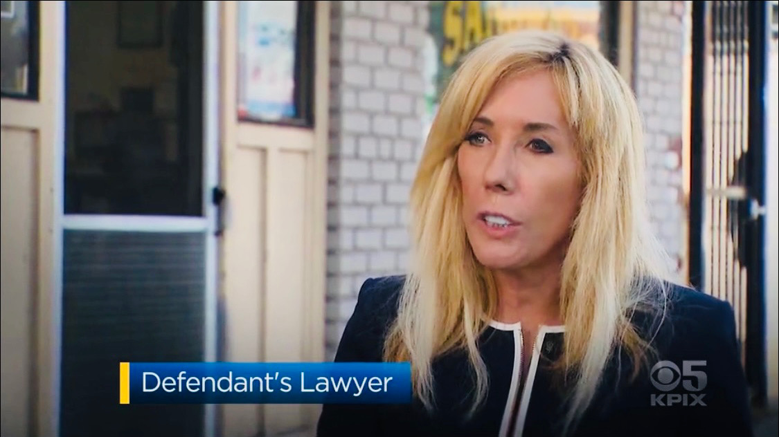blonde woman attorney being interviewed