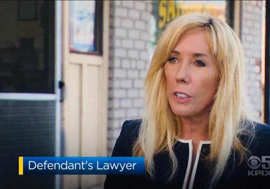 blonde woman attorney being interviewed