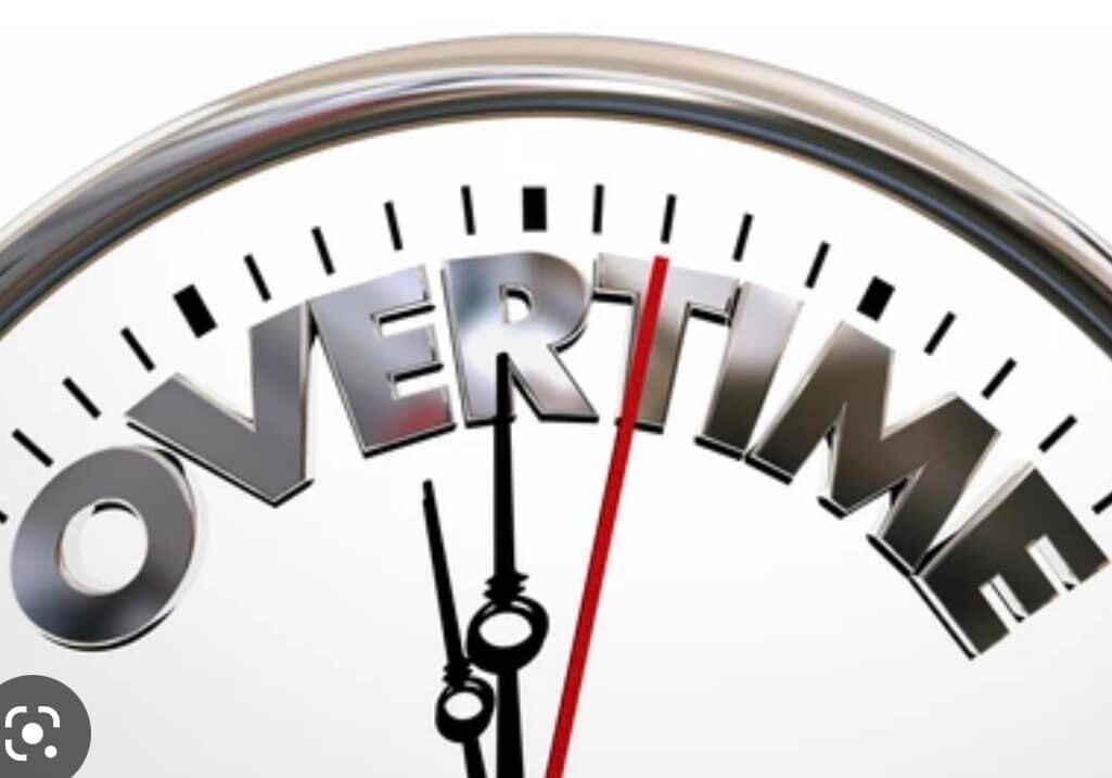 Overtime written on a clock with two needles